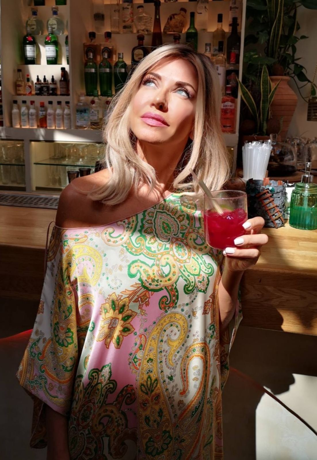 Paisley silk kaftan styling in an Athens bar