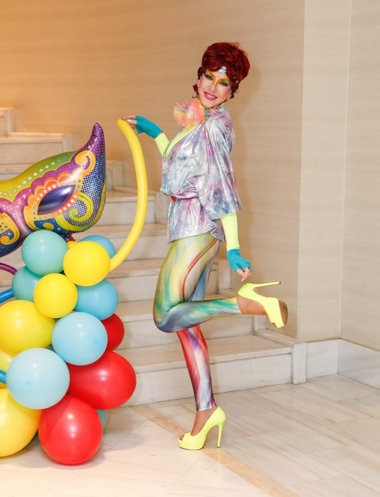 Iridescent carnival look with neon platforms and balloons
