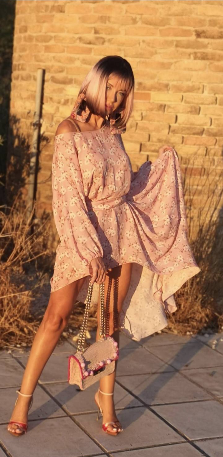 Pale pink floral dress in golden hour light