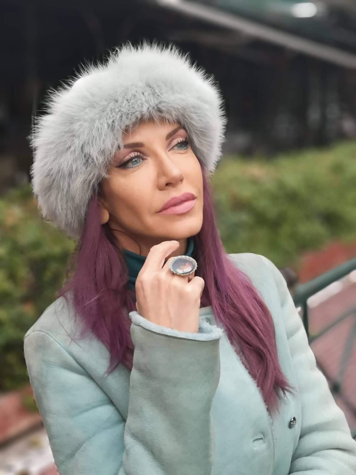 Fur hat portrait with mauve hair