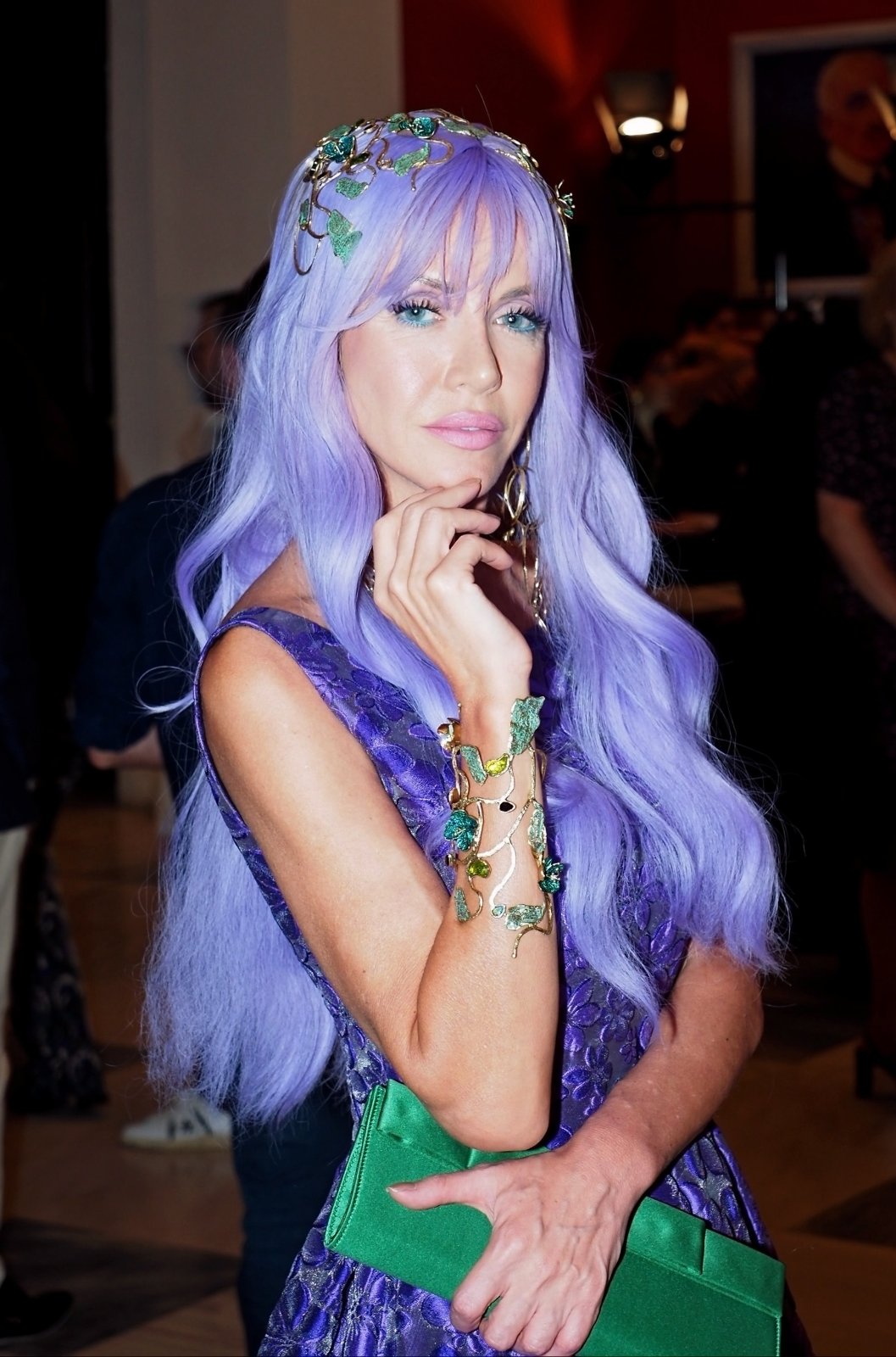Lavender hair with a jewelled vine crown and purple gown