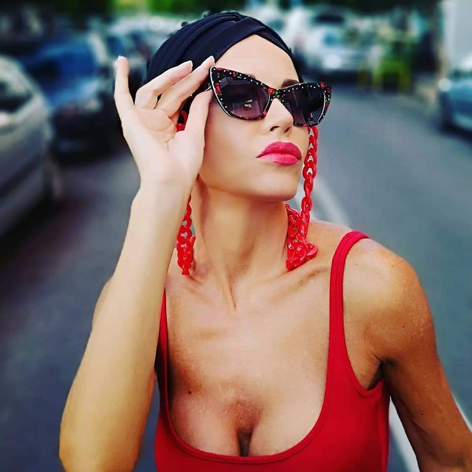 Black turban with cherry cat-eye sunglasses
